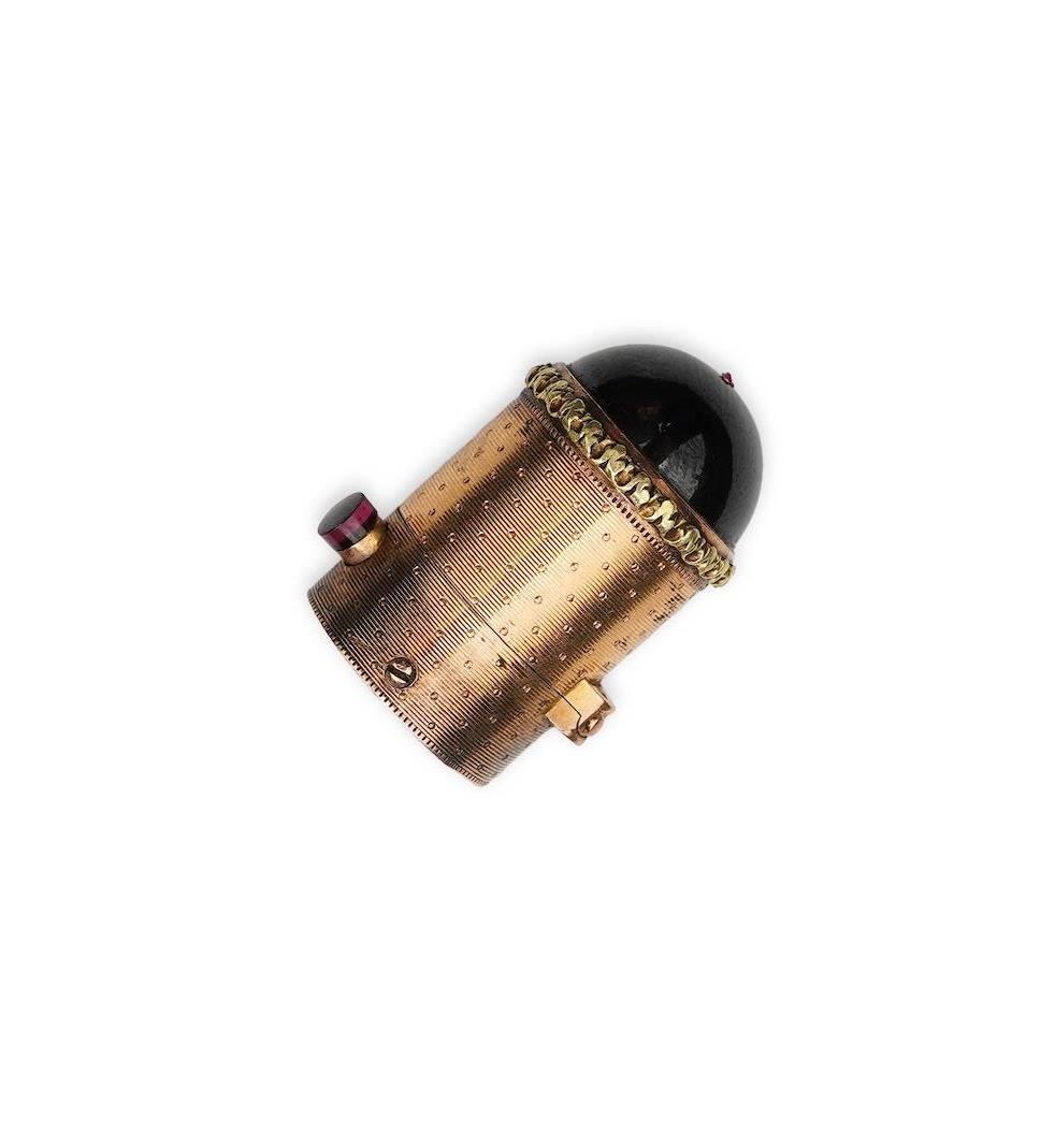 A gold and garnet perfume bottle top, France, late 19th century